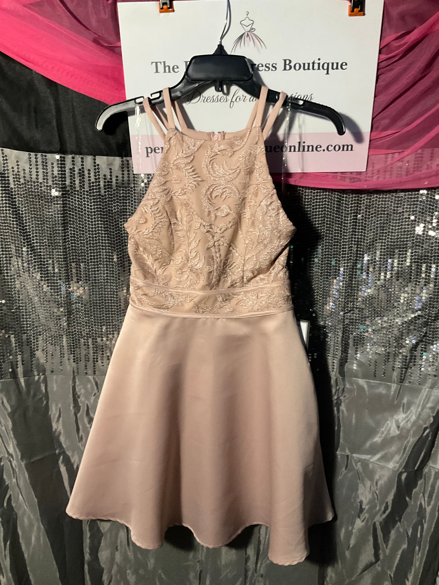 Peach colored knee length cocktail dress