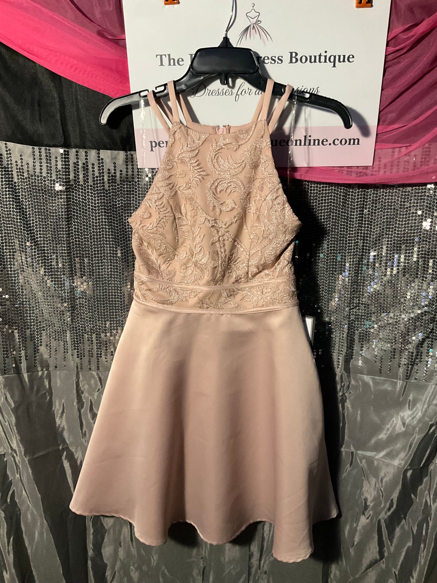 Peach colored knee length cocktail dress