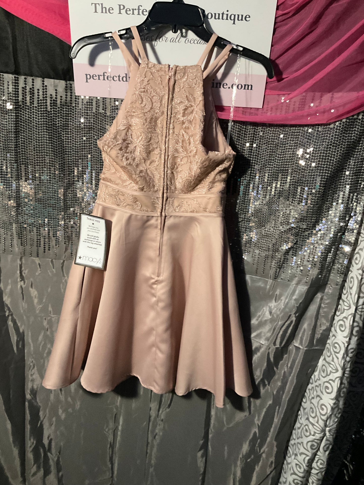 Peach colored knee length cocktail dress