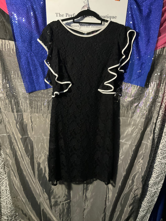 Black lace dress with white trim