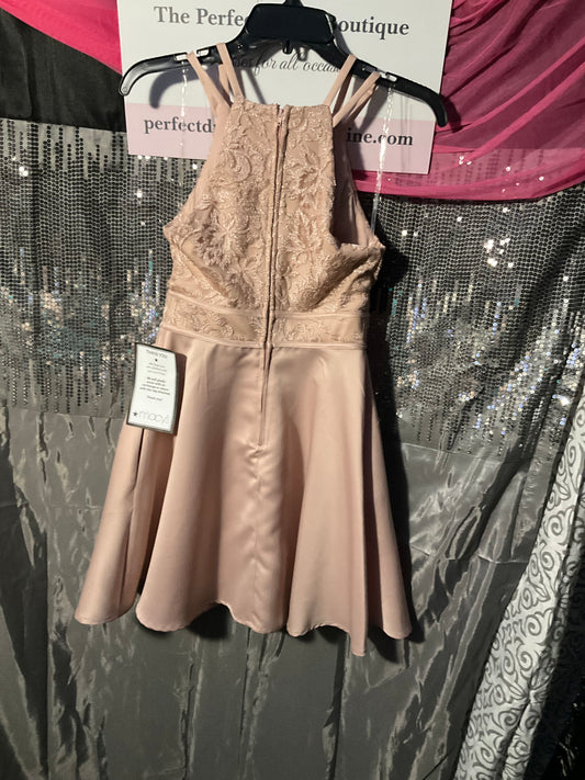 Peach colored knee length cocktail dress