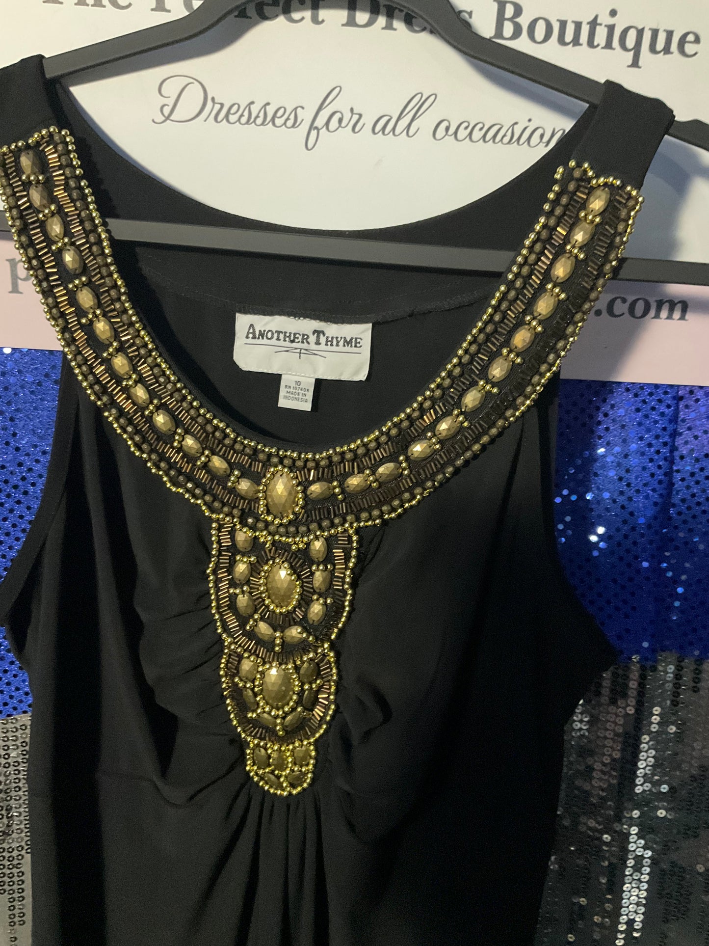 Black dress with gold embellishments